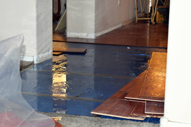 Professional Flood Damage Restoration technician working in Pompton Lakes, NJ